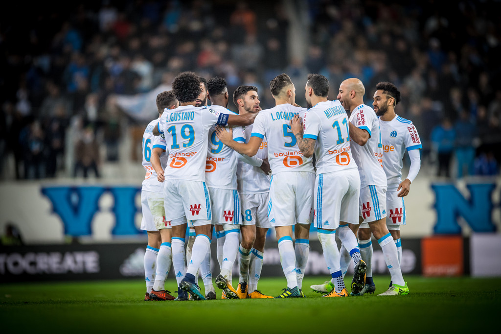 马赛欧冠征途:逆风中绽放的蓝色火焰